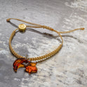 Macrame bracelet with moon and star shaped amber